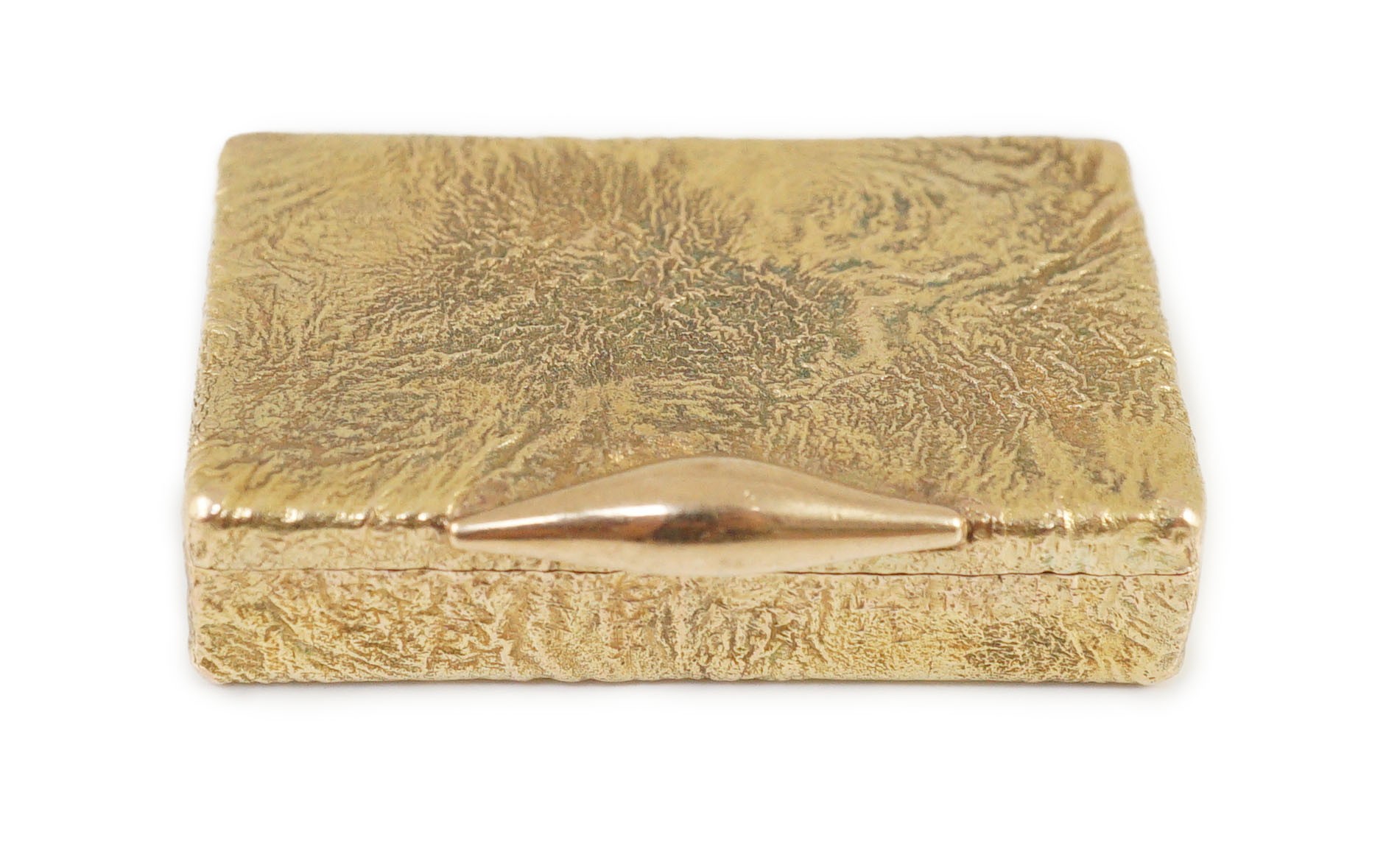 A 1960's 9ct gold Cartier rectangular pill box, with samorodok decoration